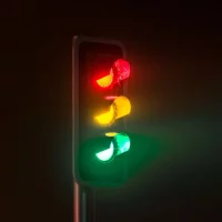 traffic-light-on-foggy-night-royalty-free-image-1694009802.webp